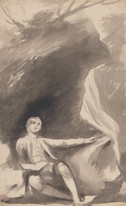 岩の下に座る少年