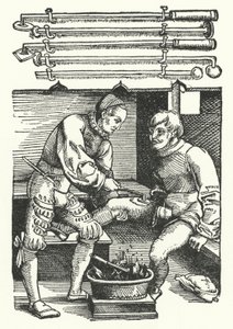 兵士の足の傷を焼灼している外科医(彫刻) 作： German School