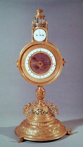 1564年、アウグスブルクのカーディナルドゥグランヴェルに属するモンストランスの形の時計（金メッキ銅） 作： German School