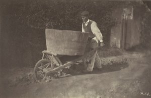 手押し車を持った農民の男性、1870年。 作： Giraudon