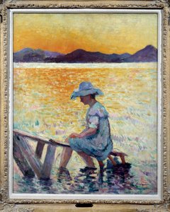 Saint Tropez, auringonlasku Nainen istuu jalkojaan vedessä rannalla 作： Henri Charles Manguin