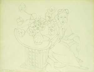 チューリップの花瓶を持つ座った女性