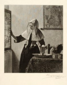 窓辺の若い女性