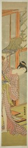 絵を掛ける若い女性 作： Isoda Koryusai