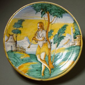 風景の中のフルート奏者。イタリア・ヴィテルボで制作された陶板。16世紀末 フィレンツェ、バルジェッロ美術館 作： Italian School