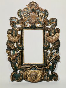 ローマの彫刻が施された黒と金箔のフレーム