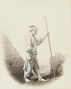 鐘を持つ日本人（手彩色のモノクロ写真 作： Japanese Photographer
