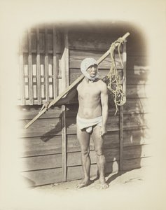 釣りかごを持った男性（手彩色のモノクロ写真 作： Japanese Photographer