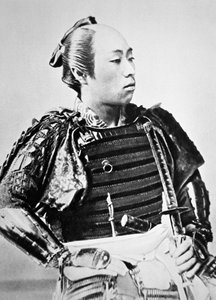 伝統的な髪型をした昔の日本の侍（モノクロ写真 作： Japanese Photographer