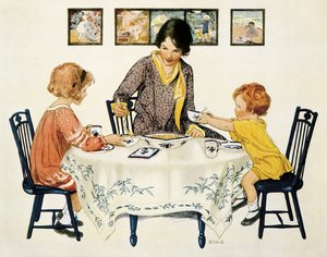 テーブルを囲んでパスタを食べる家族（母子）