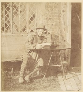 [本を読む男] 作： John Whistler
