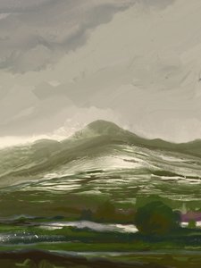 霧のかかった緑の山間の谷