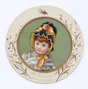 本を見ている少女の周りに腕を持つ少年のビクトリア朝のグリーティングカード 作： Kate Greenaway