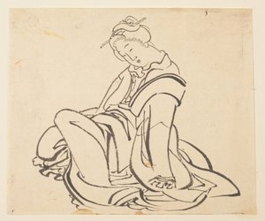 座る女性