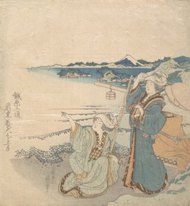 海岸で 2 人の若い女性、1 つを指しています。 作： Katsushika Hokusai