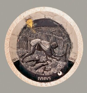 6月：小麦を収穫する農夫。ルカ・デッラ・ロッビアのテラコッタ 作： Luca Della Robbia