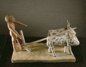 2頭の雄牛（塗られた木）によって描かれたすきを先導するすきの男の葬式モデル