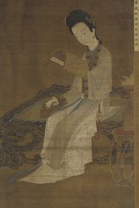 16〜17世紀の詩の本を読む若い女性