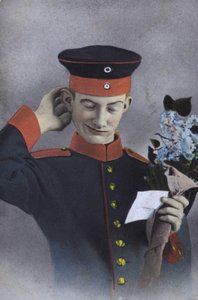メモと花束を持つドイツ軍兵士（写真 作： Photographer German
