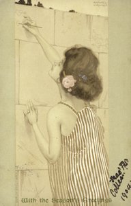 壁に書いている女の子
