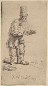 高い帽子をかぶった農民が、杖に寄りかかって立っている 作： Rembrandt van Rijn