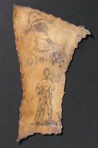 ハーレクインとサムソンの像が彫られた人間の皮膚（フランス