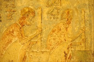 古代エジプト、壁画、ペトシリスの墓、トゥナ・エル・ゲベル、紀元前300年、杵と臼を使う作業員（写真）。 作： School Egyptian
