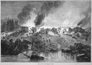 1637年のペコ戦争で、ニューイングランドの白人入植者がペコインディアンの砦を攻撃している様子（彫刻作品