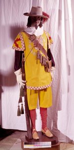 スペインのフィリップ2世（1527-1598）の時代のハーケブシュの衣装。手にはハルケブシュを持ち、肩紐には弾薬（ライフル用の火薬）が取り付けられている。マドリード軍事博物館 作： Spanish School