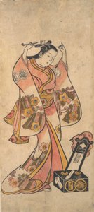 漆の鏡の前で髪を整える女の三条貫太郎（1763年以前 作： Torii Kiyomasu II.