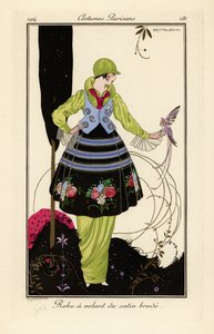 エンドウグリーンのドレスに刺繍のサテンスカートを合わせた女性。 作： Umberto Brunelleschi