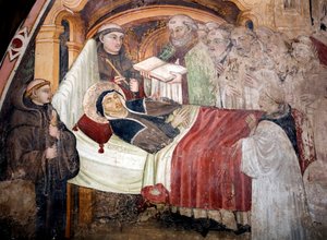 ヌルシーの聖ベネディクトの妹、聖スコラスティクス（v.480- v.543）の死 彼女はベネディクト会の修道士に囲まれている。15世紀のウンブリア派のフレスコ画。イタリア、スビアコ（ローマ）、聖ベネデット修道院（サクロ・スペコ