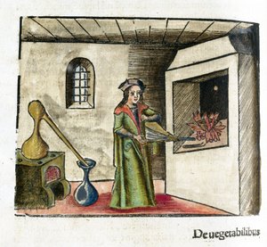 16世紀の錬金術：作業場の暖炉の前でふいごを動かす錬金術師、その後ろにはストーブとスチルがある 作： Unbekannt