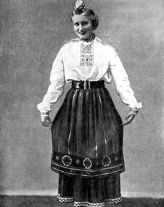 1936年の伝統的な衣装を着たエストニアの女性 作： Unbekannt