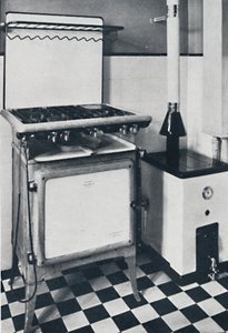 理想的なボイラー＆ラジエーター株式会社-黒と白または灰色のまだらにされて、このガスボイラーは硝子体です。 作： Unbekannt