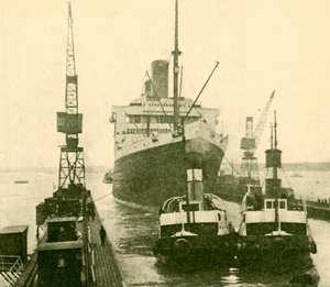 タグボートによって運ばれた雄大な乾ドック、c1930。