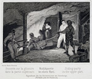 塩坑：地下に続く滑り台の上部に座る観光客（オーストリア・ドゥルンブルグ 作： Unbekannt