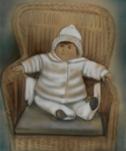 椅子に座る子供 作： 身元不明
