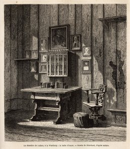 1521年に破門された後、ヴァルトブルクに避難したマルティン・ルターの部屋（1483-1546）。机の上には彼の肖像と両親の肖像が飾られており、その下で彼は聖書をドイツ語に翻訳し、最も有名な文章を書き直した。インクは 作： Unknown artist