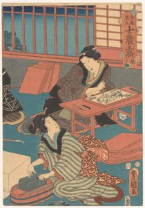 絵を描く女性（右）