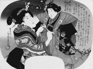 愛番団扇絵：子供をドレスアップする女性