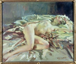 ベッドに横たわる女性のヌード