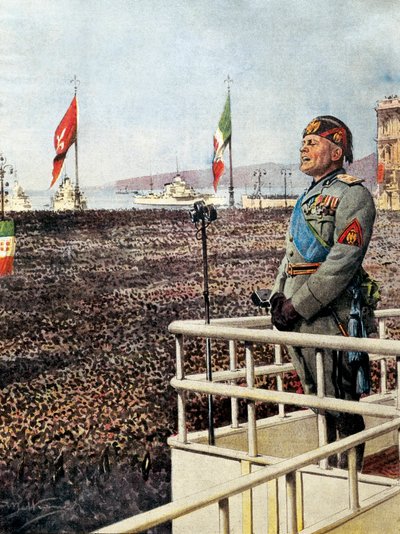 BELTRAME, Achilles (1871-1945).MUSSOLINI, Benito (1883-1945).イタリアのファシスト政治家、イタリアのドゥーチェ（指導者）（1925-1943年）。トリエステの人々と世界に語りかけるドゥーチェ（1938年9月）。Domenica del Corr」のためのAchille Beltrameのイラスト。 作： Achille Beltrame