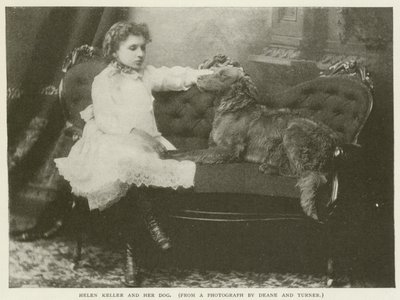ヘレンケラーと彼女の犬 作： American Photographer