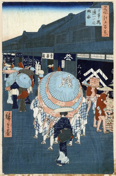 日本の木版画: 日本橋通り (東京、日本) のメインストリートの眺め。 名所江戸百景シリーズ。 （日本橋通一丁目の眺め 名所江戸百景）。 歌川広重（1797-1858）の作品、木版画 作： Ando or Utagawa Hiroshige