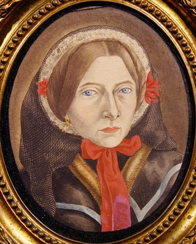 ボンネットと赤いリボンをつけた女性の肖像 1830年頃（紙にガッシュ） 作： Austrian School