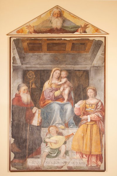 聖母子像、聖アントニー大王、聖バルバラと音楽家の天使 作： Bernardino Luini