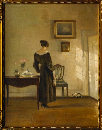 猫に餌をやる女性のいるインテリア（キャンバスに油彩） 作： Carl Holsoe