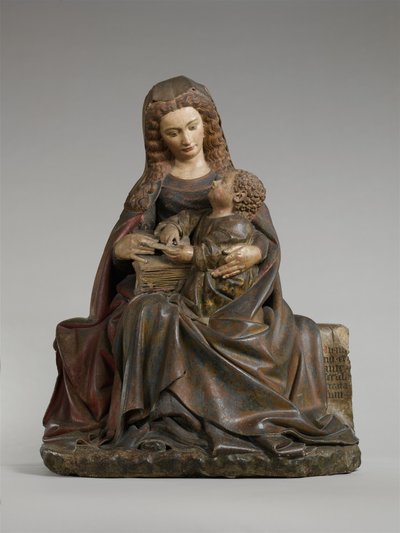 聖母子像 1415-17年頃 ライムストーンにペイントと金箔を施したもの 作： Claus de Werve
