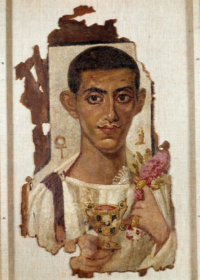 古代エジプト：アンモニオスの肖像：エメラルドで装飾された黄金のカンタラを持ち、ディオニュソスであることを示すワインを満たしている男の表現。黄金の騎士の左手には、再生の象徴であるバラの花輪が頭の近くにある。 作： Coptic